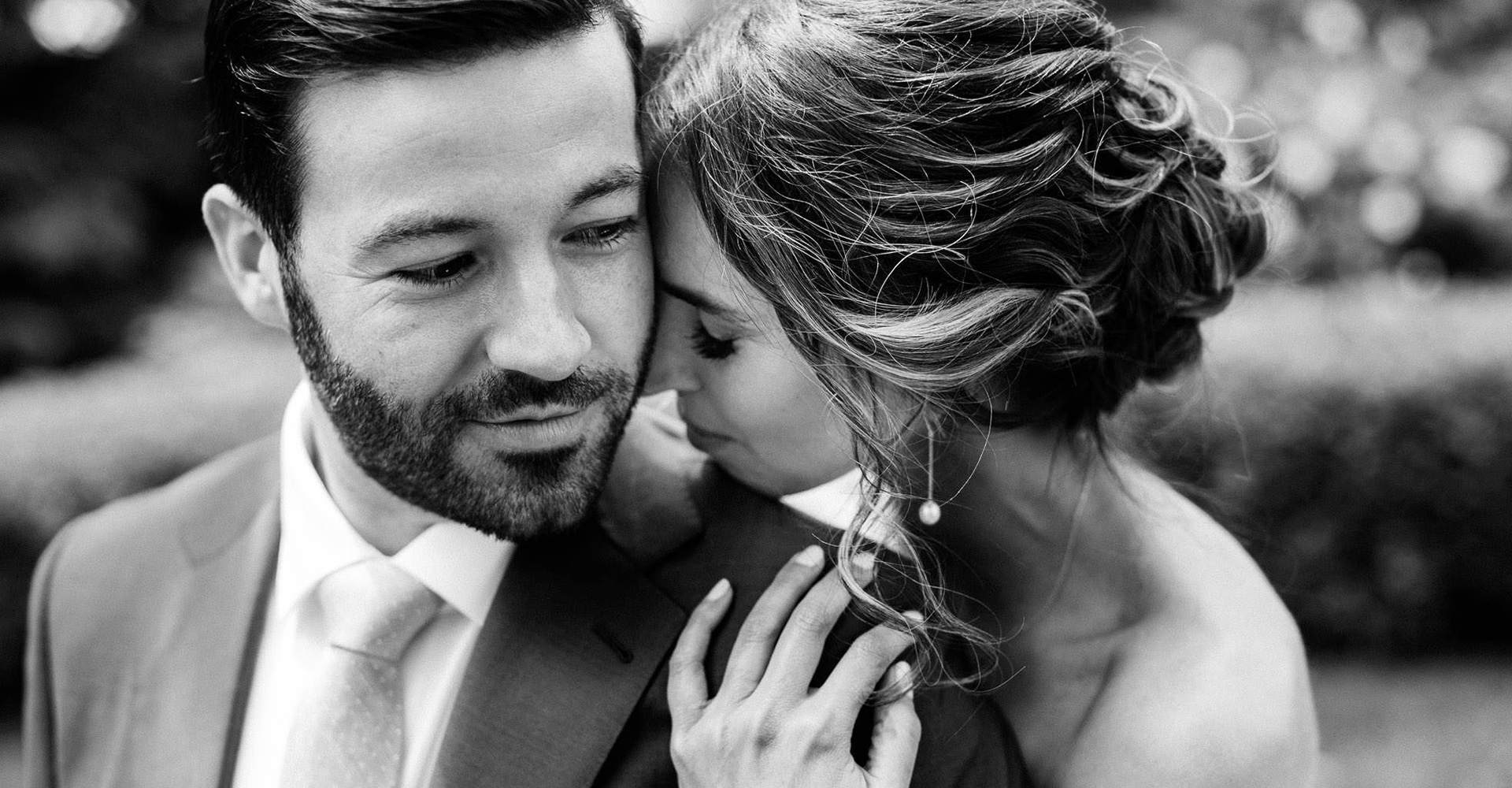 embracing couple at their wedding, nyc wedding photographers