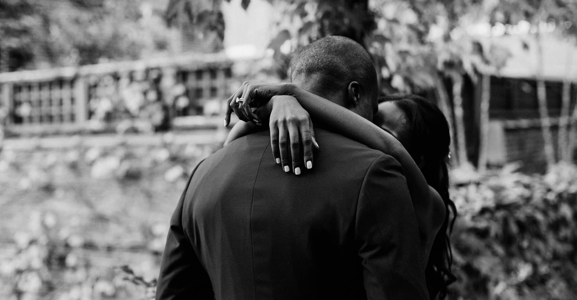 black and white photo of a couple hugging, nyc wedding photographers